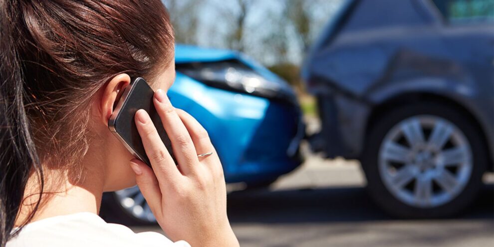 Illustration showcasing a car with an insurance policy, symbolizing the importance of car insurance in the UK.